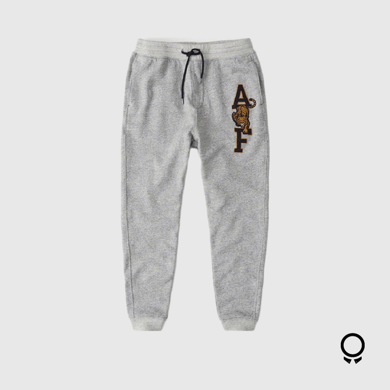 JOGGER ABERCROMBIE GRIS LOGO TIGRE