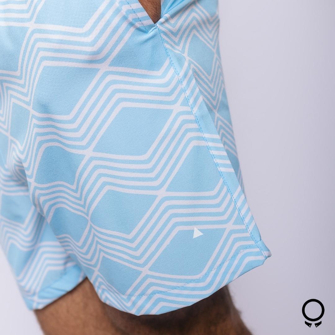 SHORT DE BAÑO LIBERATO BASICS GEOMETRICOS CELESTE