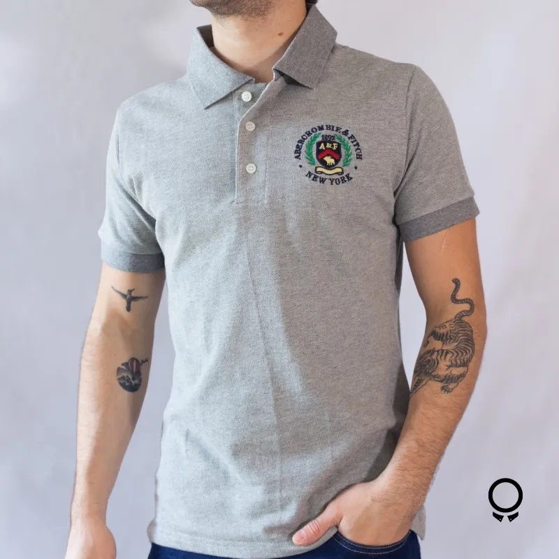 REMERA ABERCROMBIE CUELLO POLO GRIS