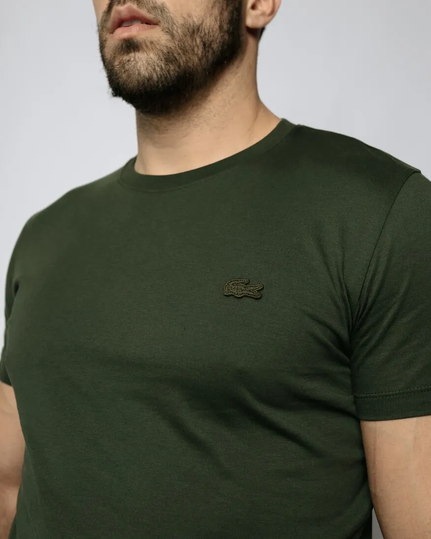 REMERA LACOSTE CUELLO REDONDO PARIS VERDE OSCURO