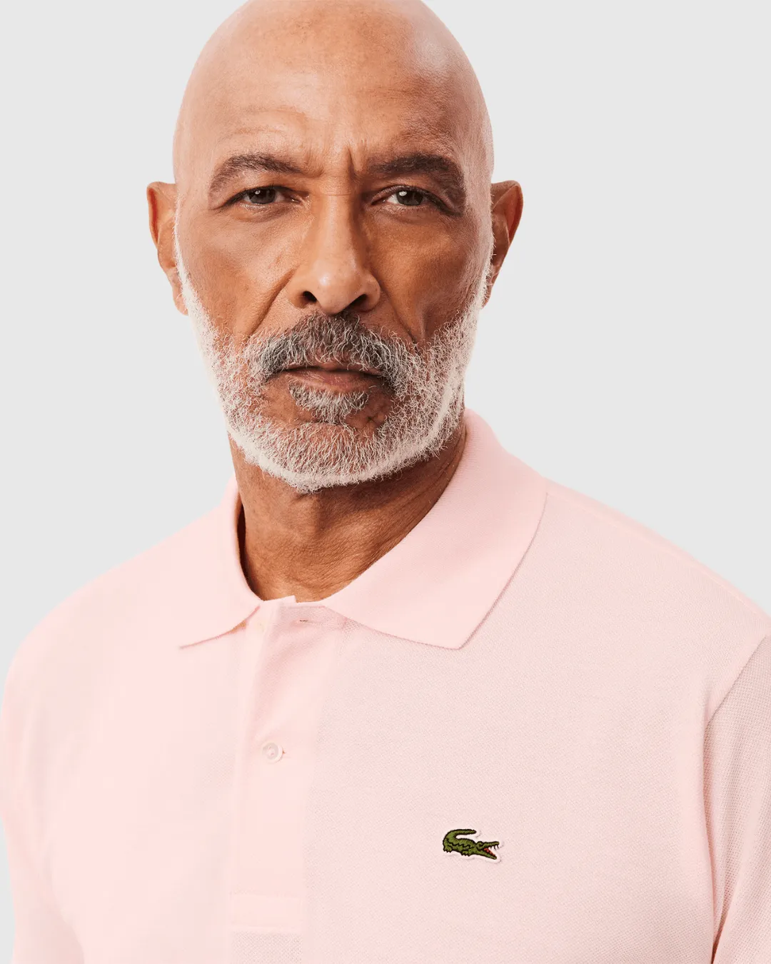 REMERA CUELLO POLO LACOSTE ROSADA