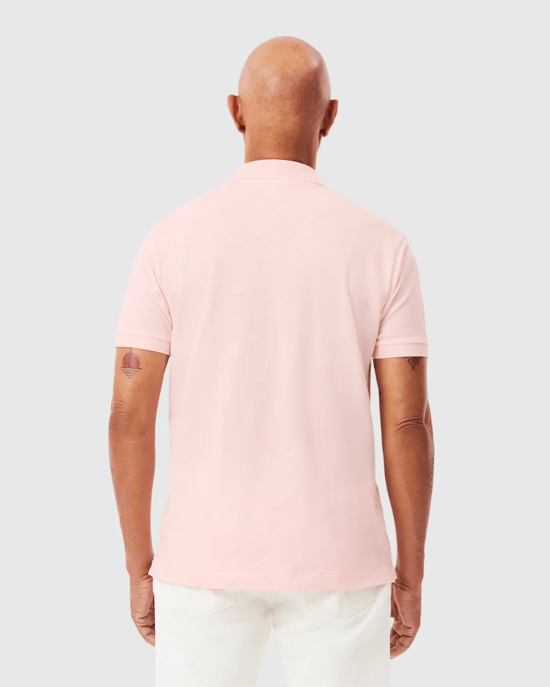 REMERA CUELLO POLO LACOSTE ROSADA