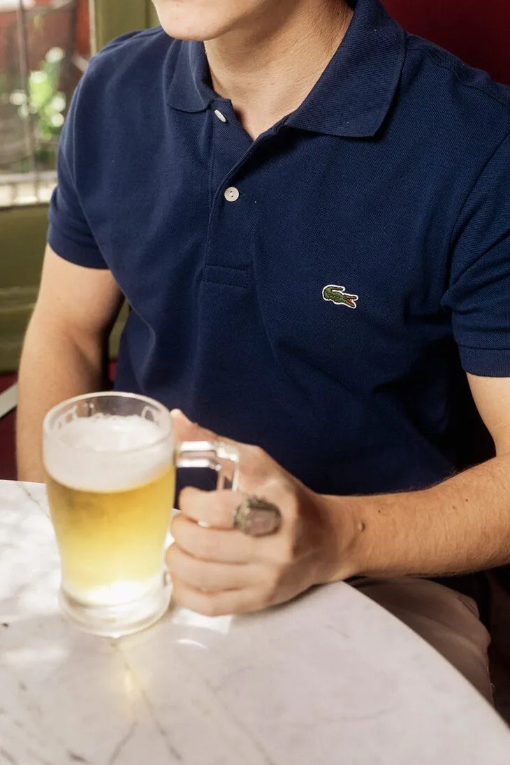 REMERA CUELLO POLO LACOSTE  AZUL