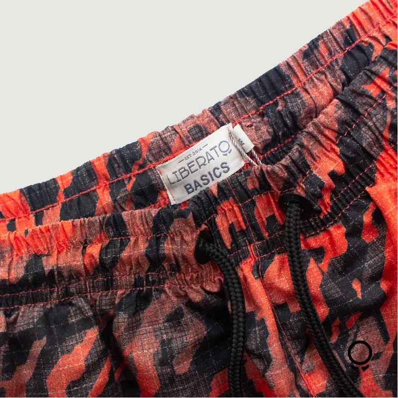 SHORT DE BAÑO LIBERATO BASICS ESTAMPADO CAMO ANARANJADO