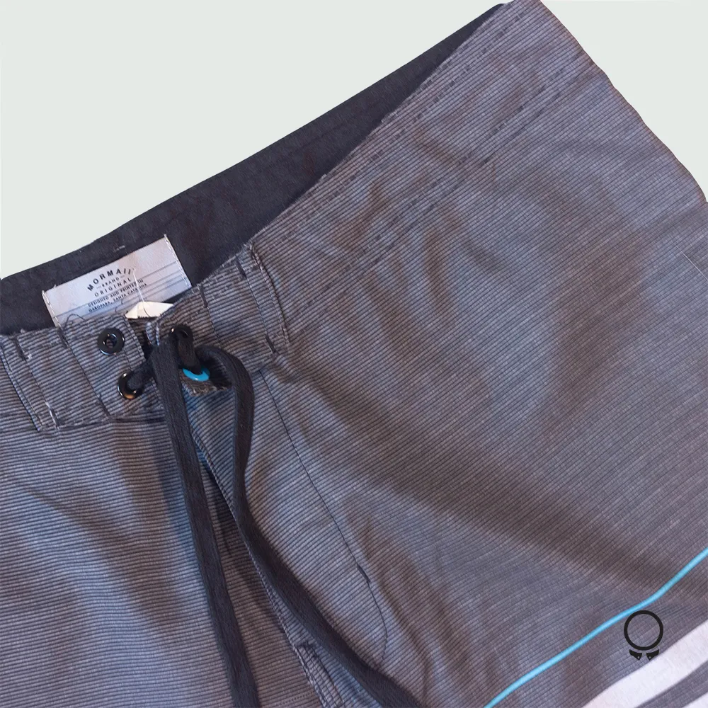 SHORT NEGRO RAYADA TURQUESA Y GR34