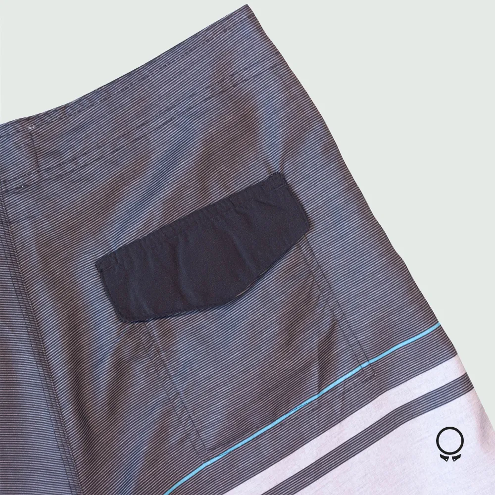 SHORT NEGRO RAYADA TURQUESA Y GR34
