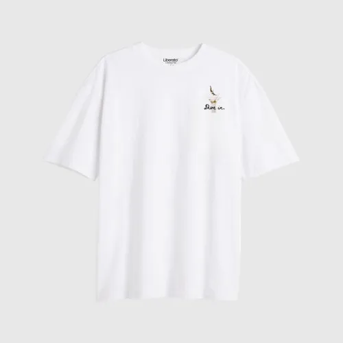 Remera Liberato Oversize Marfil Dive In
